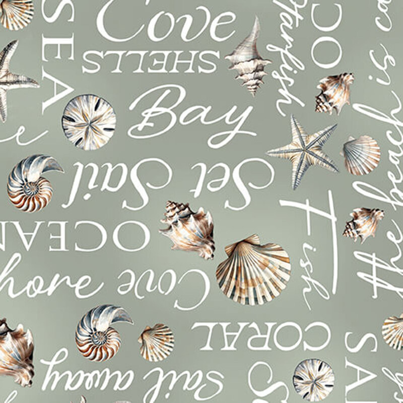 Mottled sea green fabric featuring ocean-theme words and seashells.