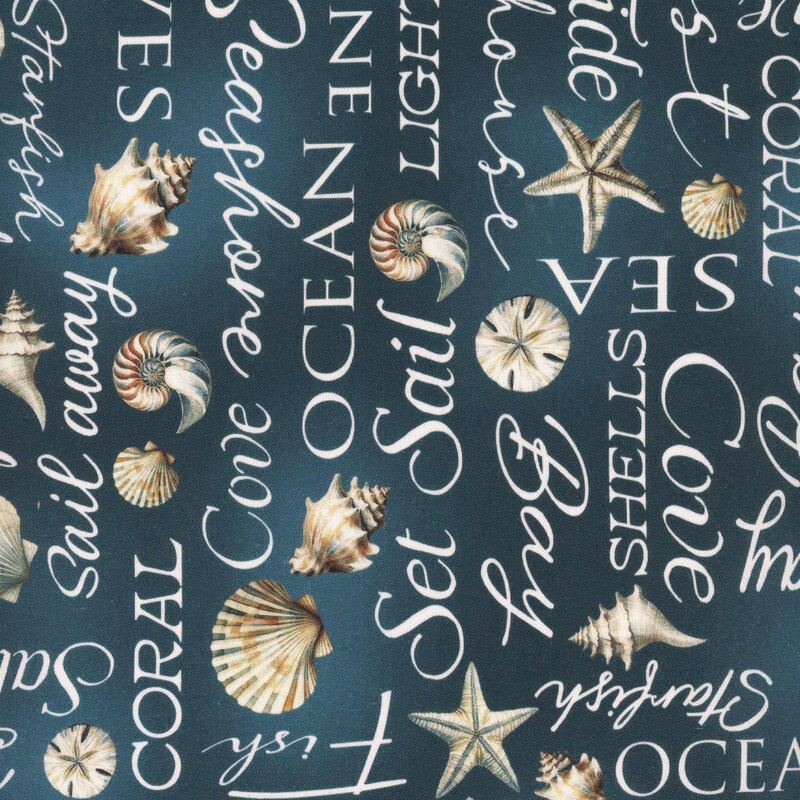 Mottled navy blue fabric featuring ocean-theme words and seashells.
