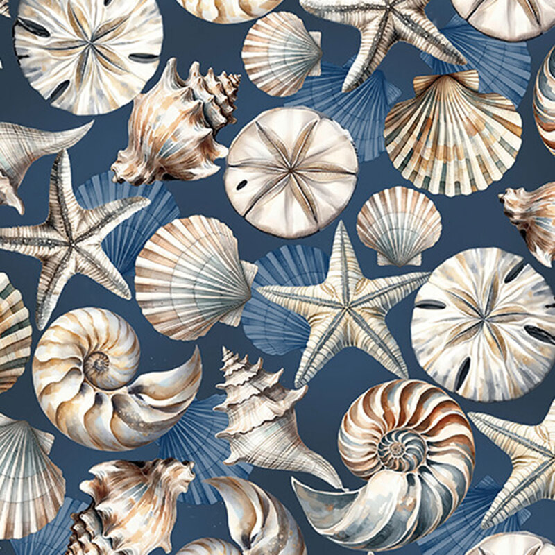 Navy blue fabric scattered with various seashells in tans and browns.