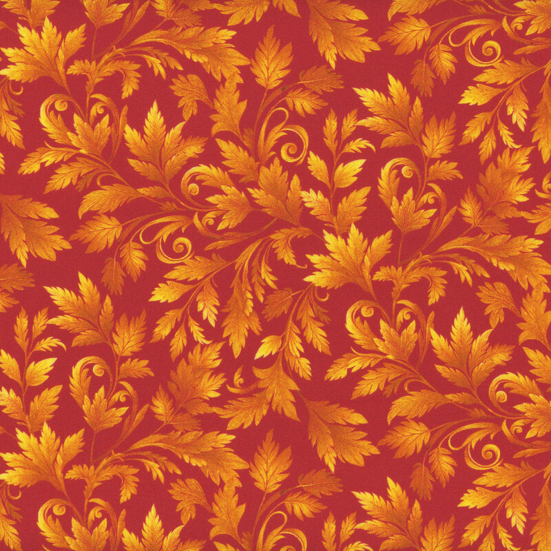 Bright pumpkin orange fabric with a yellow gold swirling leaf pattern