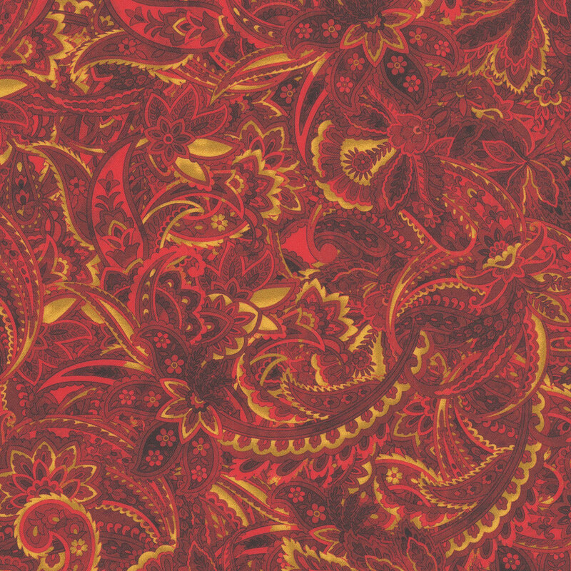 fabric packed with bold yellow, russet, and red paisley florals and flowers