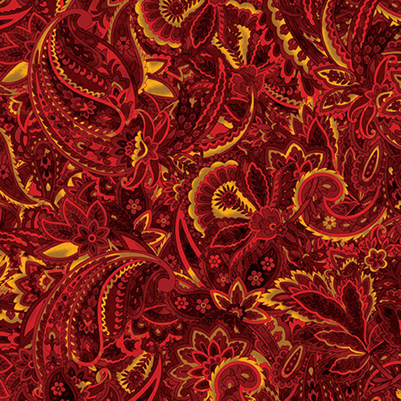 fabric packed with bold yellow, russet, and red paisley florals and flowers