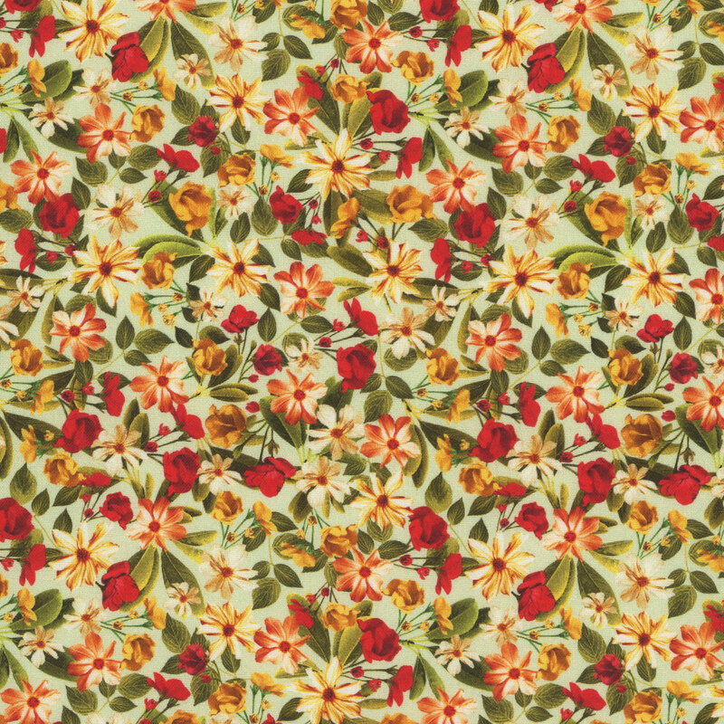 Orange and yellow african daisies, red and yellow roses, and green leaves on a sage green background.