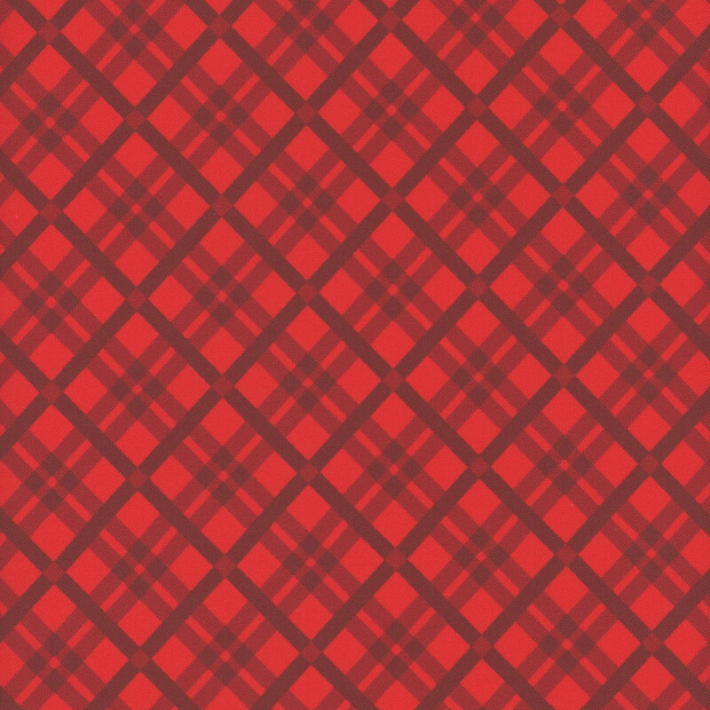 A scarlet fabric with a cranberry red tartan pattern