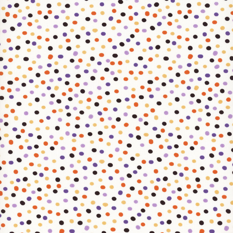 white fabric with multicolor polka dots.