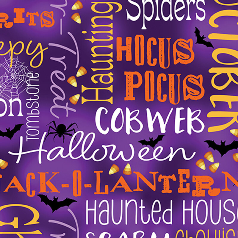 mottled purple fabric featuring Halloween-themed words, spider webs, spiders, bats, and candy corn in colors of yellow, orange, purple, and white.