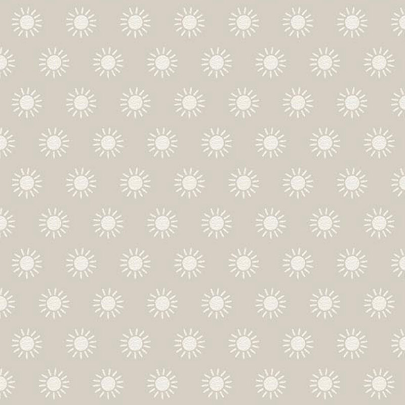 taupe fabric featuring rows of cream colored suns.