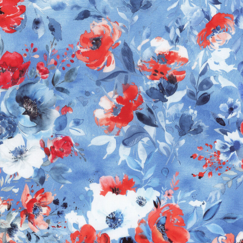 roses and flowers in red, white, and blue on mottled blue fabric.