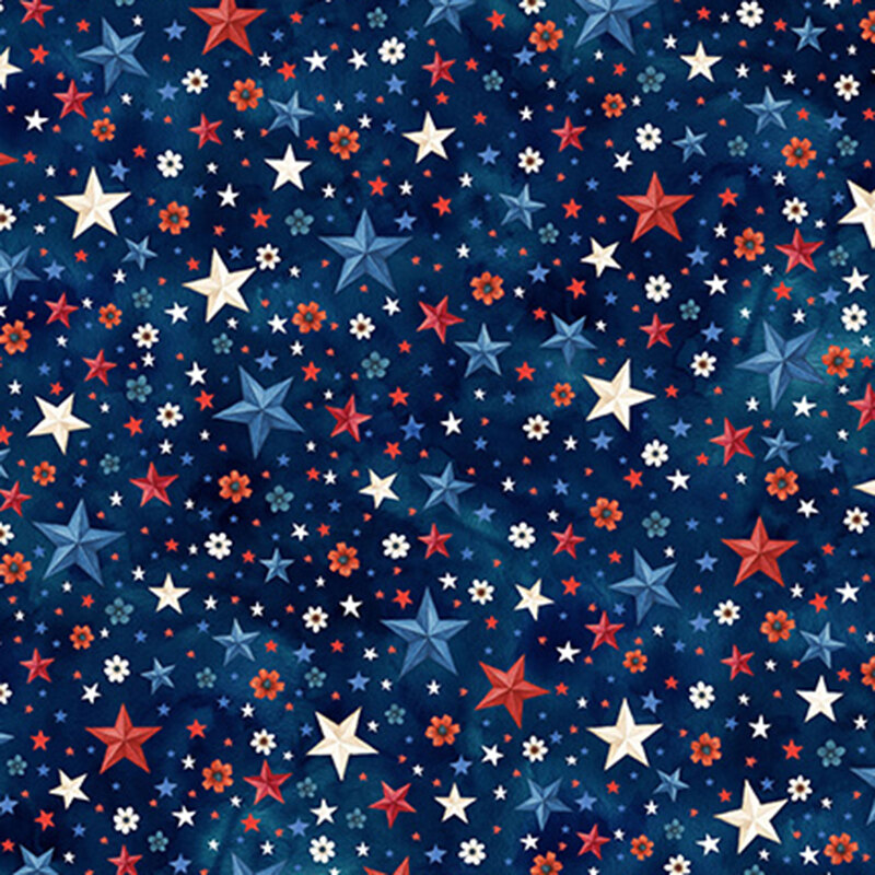 mottled navy blue fabric featuring tossed stars and flowers in red, white, and blue