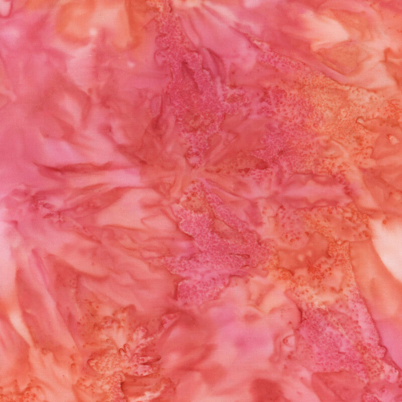 Hot pink watercolor effect fabric with orange areas