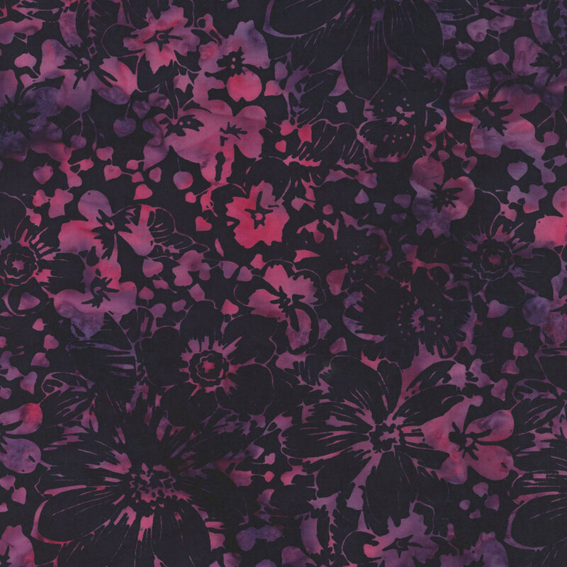 Purple and pink watercolor fabric with a black floral overlay 