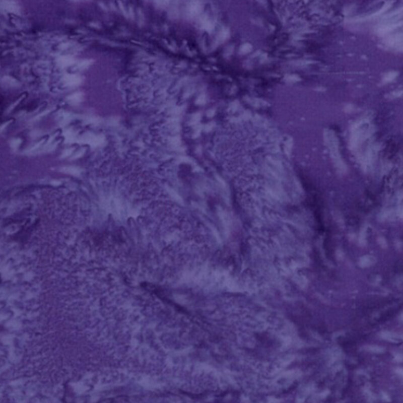 A tonal mottled dark purple fabric. 
