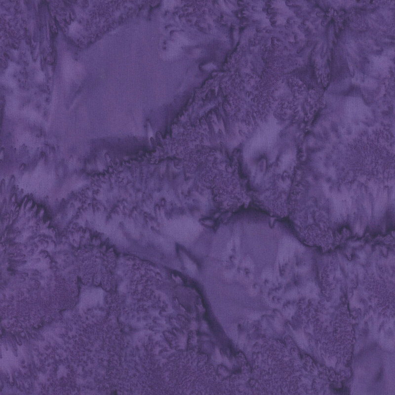 A tonal mottled dark purple fabric. 