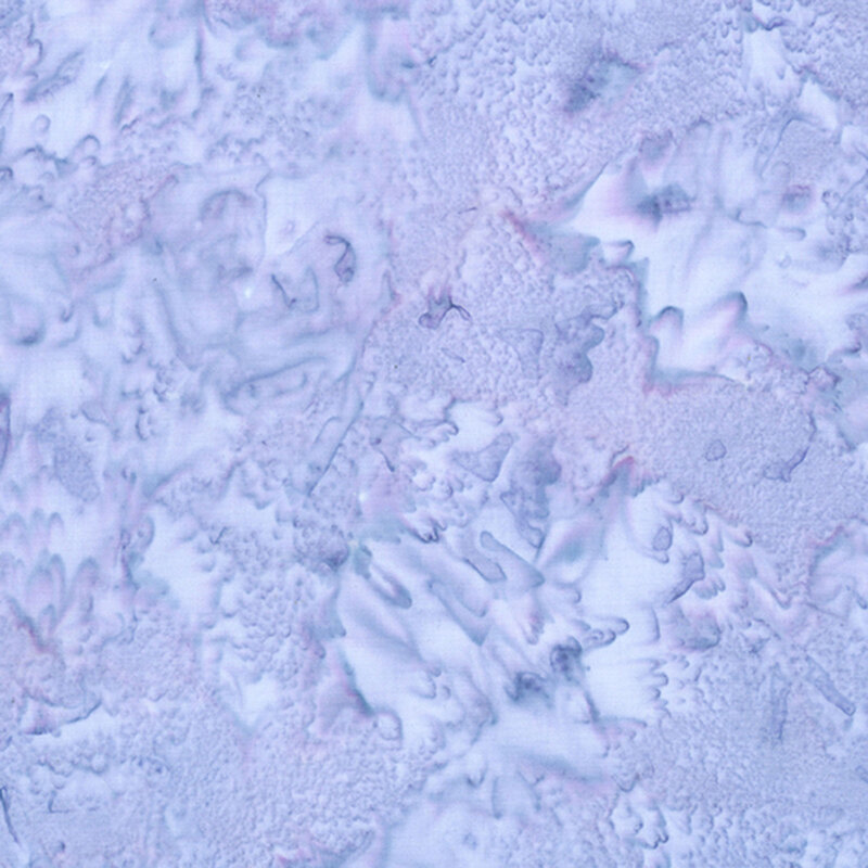 A tonal very light purple mottled fabric. 
