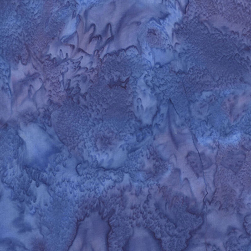 A tonal mottled indigo blue fabric. 
