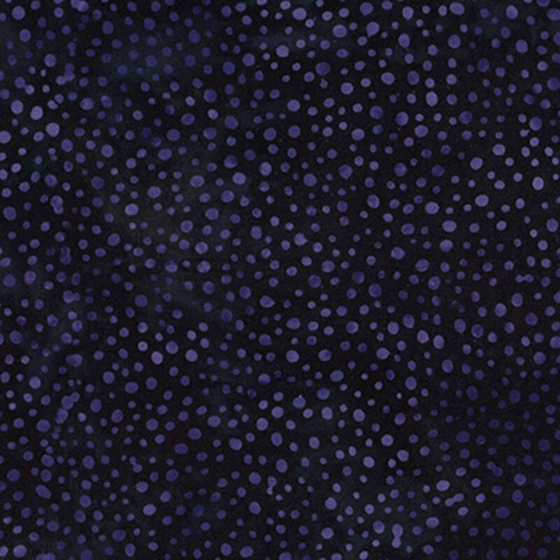 A tonal mottled dark purple fabric with lighter purple dots. 