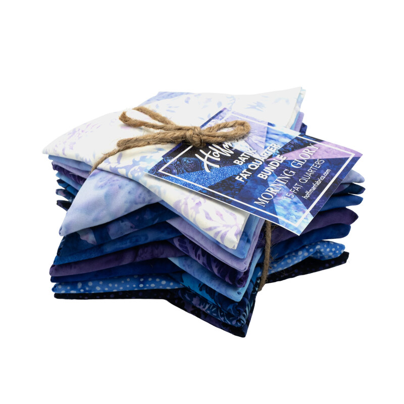 The Bali Batiks - Morning Glory Fat Quarter Bundle in its star shaped packaging, isolated on a white background.
