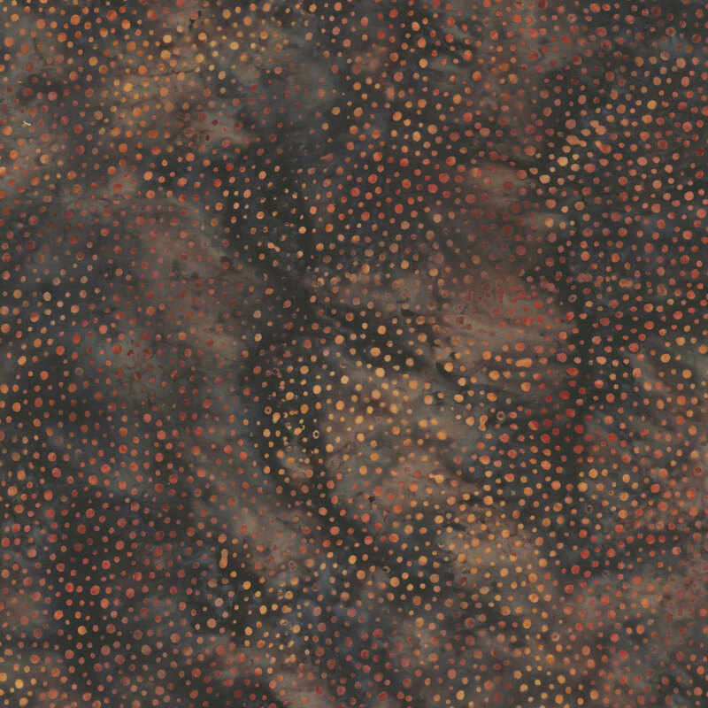 mottled dots of red and orange on a mottled brown background