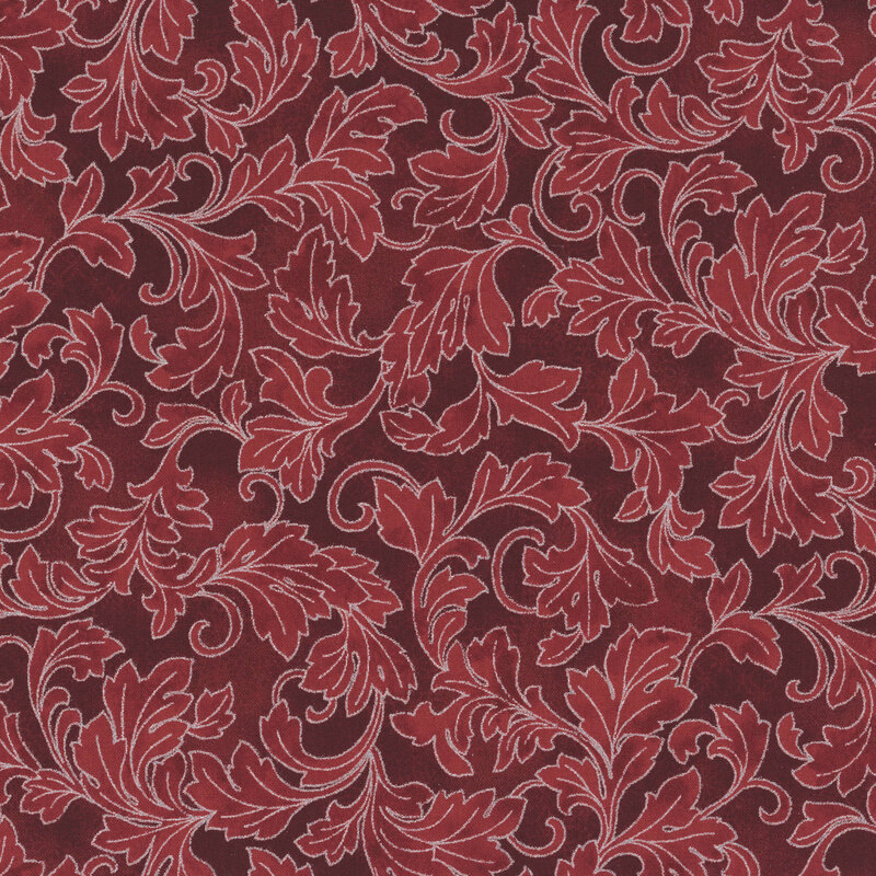 Maroon patterned background with ruby ornamental leaves outlined in metallic silver