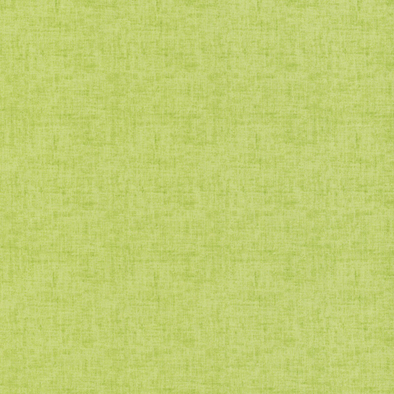 Honeydew green fabric with a tonal linen texture.