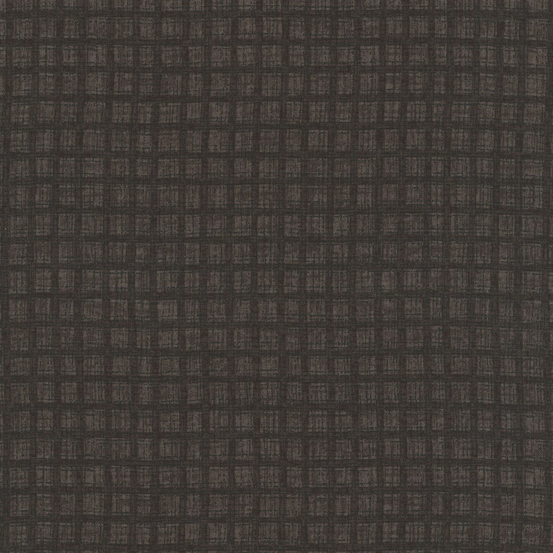 Carob brown fabric with a brown black textured thatched plaid pattern