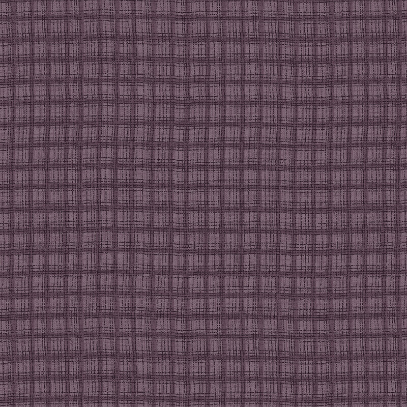 Purple fabric with a muted plum textured thatched plaid pattern