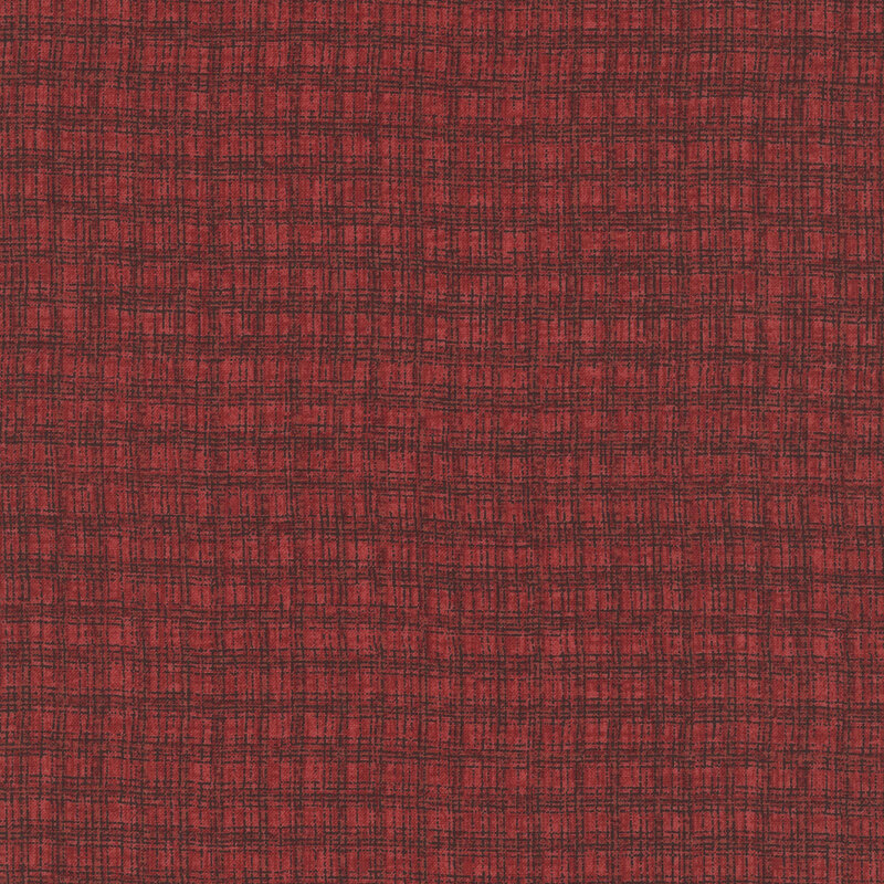 Brick red fabric with a maroon textured thatched plaid pattern