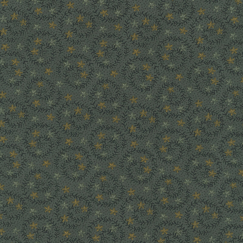 Dark denim blue fabric featuring swirling navy vines with sage and yellow stars