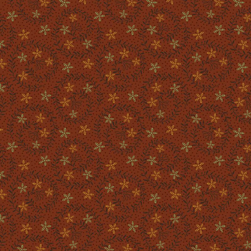 Brick red fabric featuring swirling charcoal vines with orange and sage stars