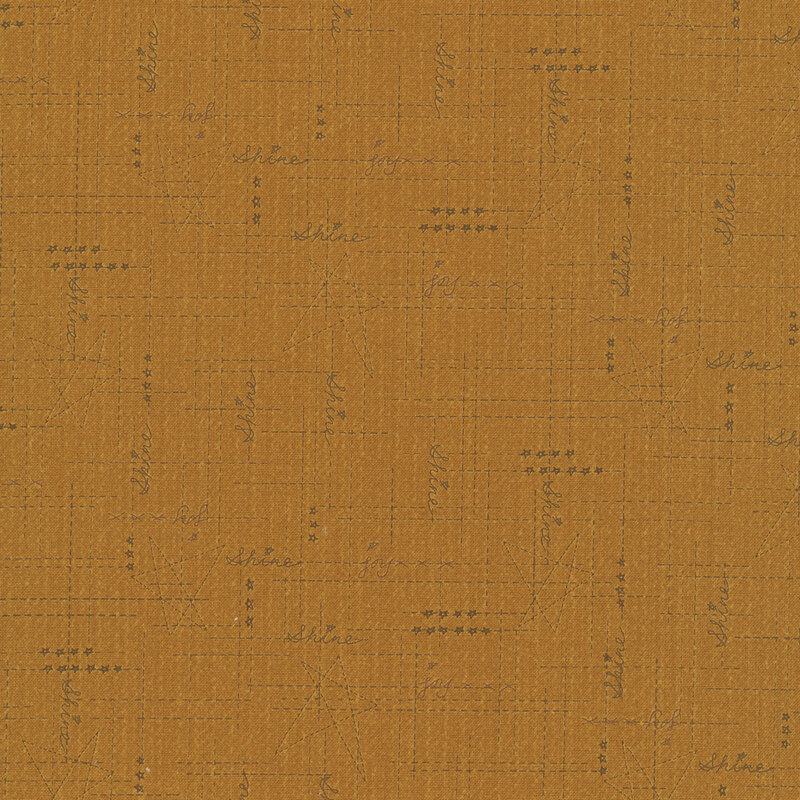 Gold fabric with brown criss cross dotted lines, stars, and the words "Shine" and "Joy"
