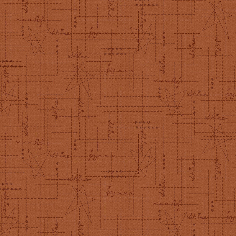 Burnt sienna fabric with cinnamon brown criss cross dotted lines, stars, and the words 