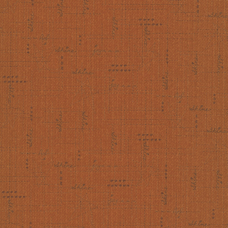 Burnt sienna fabric with cinnamon brown criss cross dotted lines, stars, and the words "Shine" and "Joy"