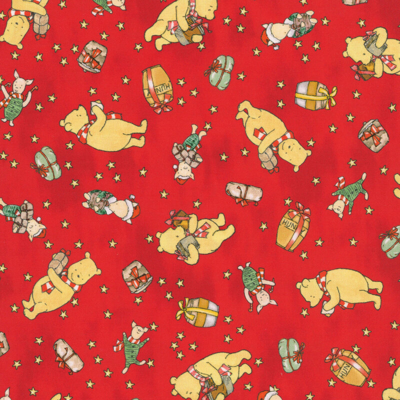 mottled bright red fabric featuring Winnie the Pooh and Piglet, presents, and jars of honey surrounded by stars.