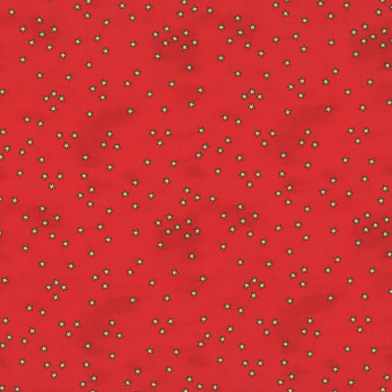 mottled bright red fabric scattered with yellow stars