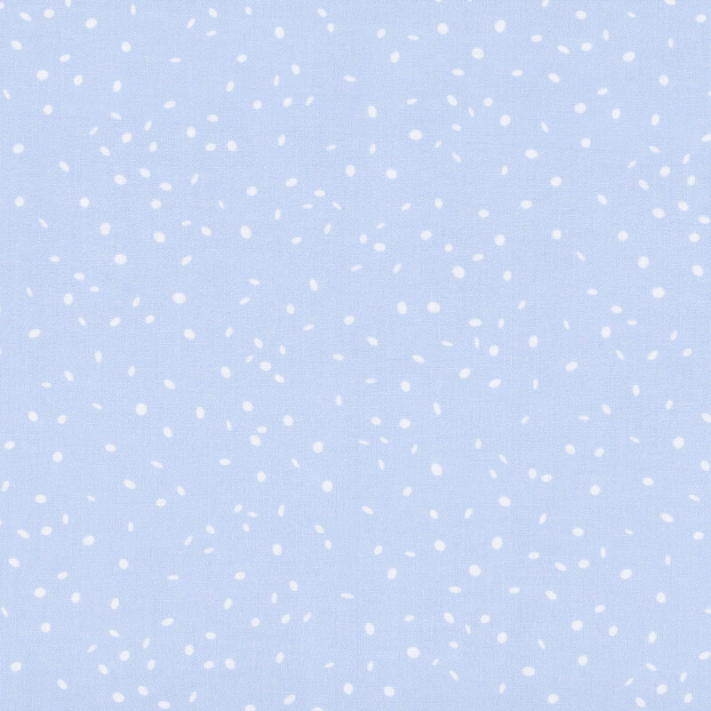 powder blue fabric featuring stylized disks like falling snow