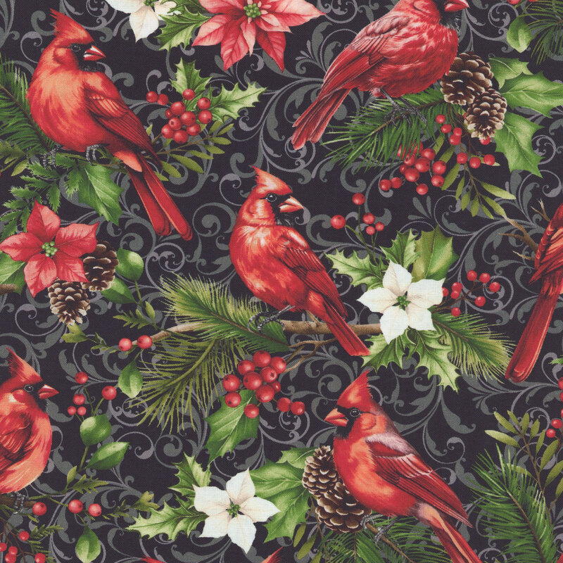 Black fabric with a pattern of cardinals on branches, poinsettias, winterberries, and a filigree in the background. 