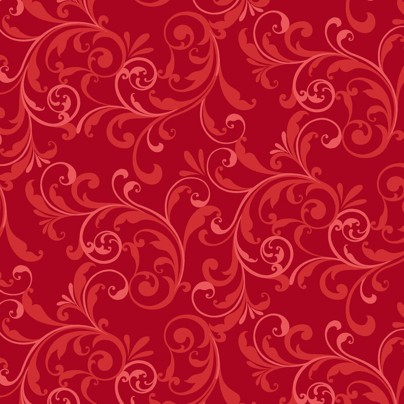 Red fabric with a tonal filigree pattern.
