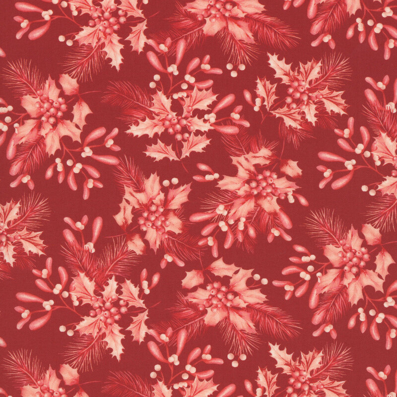 Red fabric with clusters of holly, pine, and mistletoe leaves in its pattern.