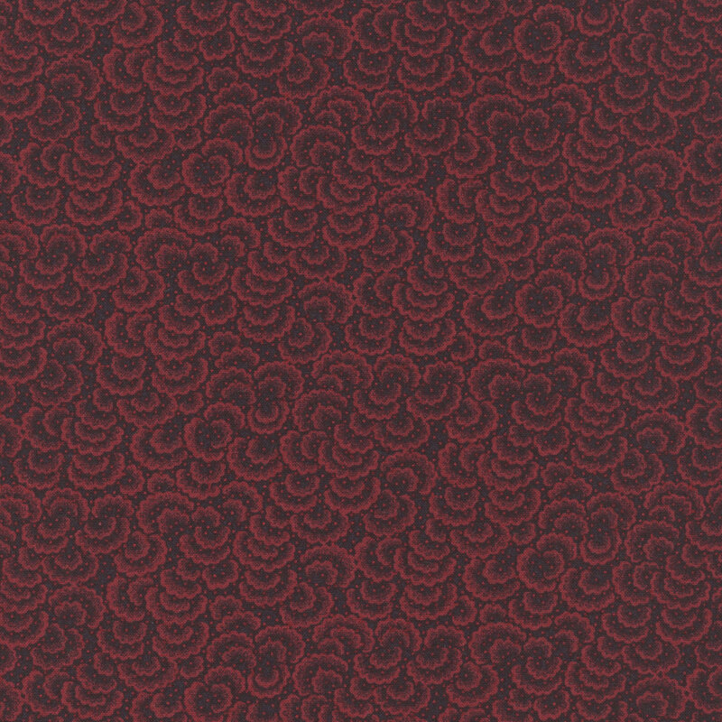 overlapping scalloped shells in wine red and small pin dots on deep red fabric