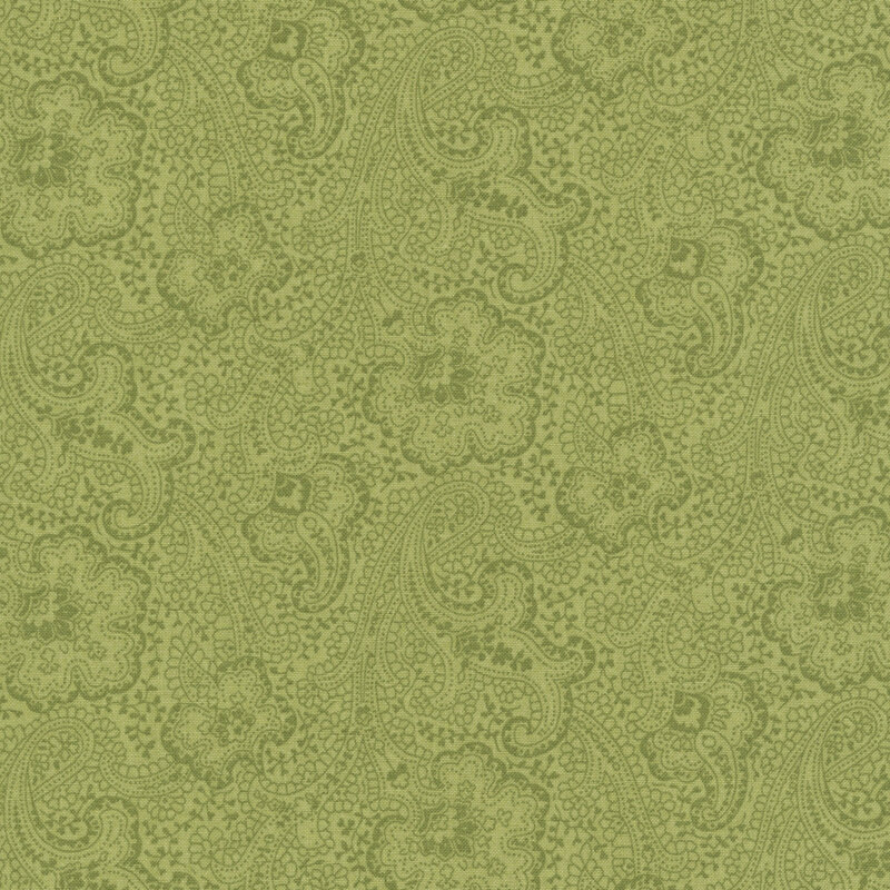 Tonal sage green fabric featuring a floral and leaf paisley design.