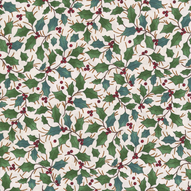 Sprigs of holly with red berries tossed on mottled cream fabric