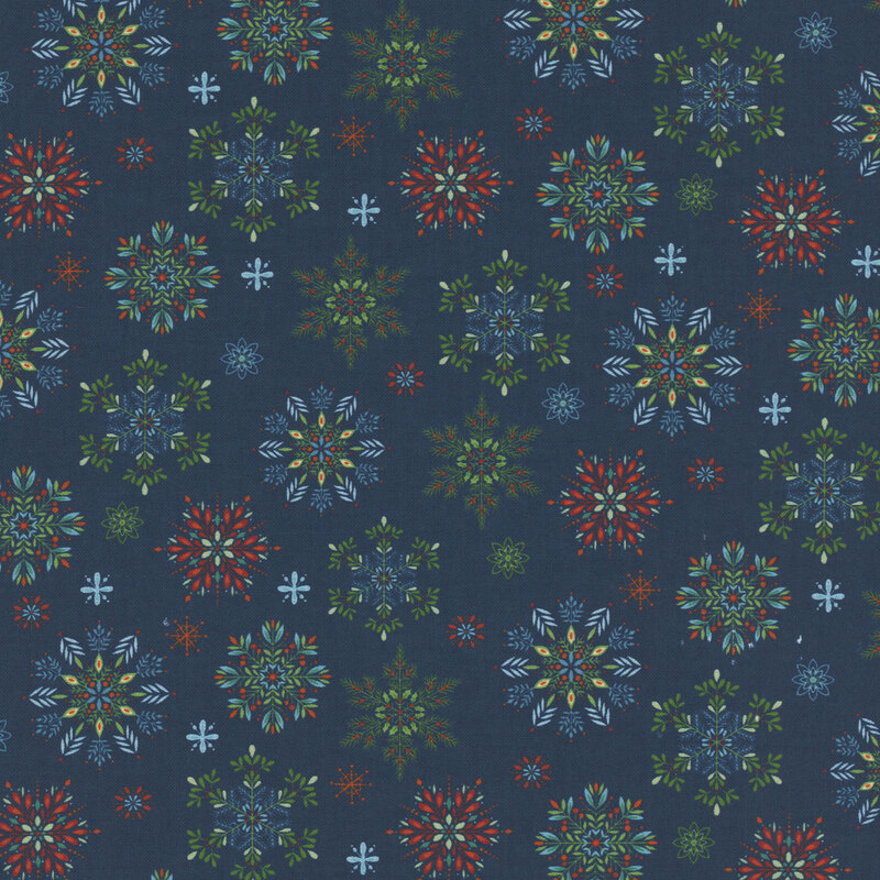 blue fabric with a pattern of stylized snowflakes composed of various holiday-themed leaves.