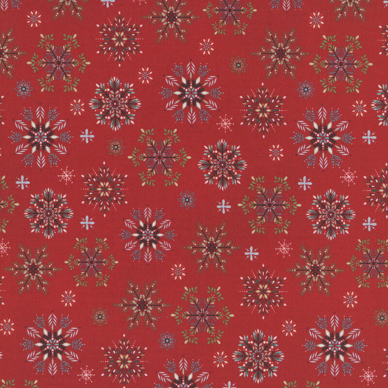 Red fabric with a pattern of stylized snowflakes composed of various holiday-themed leaves.