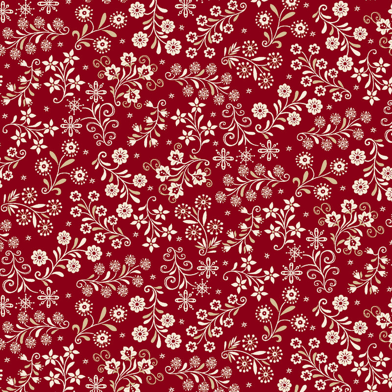 Red fabric with a stylized Scandinavian-themed design of white florals, snowflakes, and small stars.