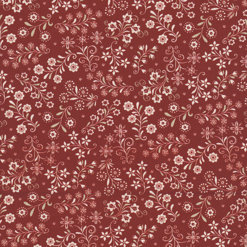 Red fabric with a stylized Scandinavian-themed design of white florals, snowflakes, and small stars.