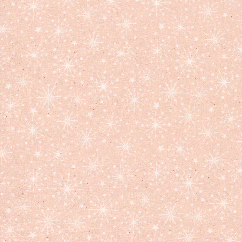 A grungy light pink fabric with snowflakes and shining stars. 