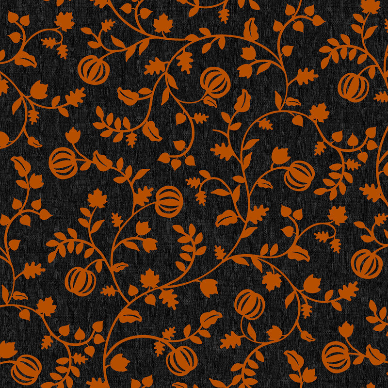 Twisting pumpkin orange vines with growing pumpkins and leaves on jet black fabric.