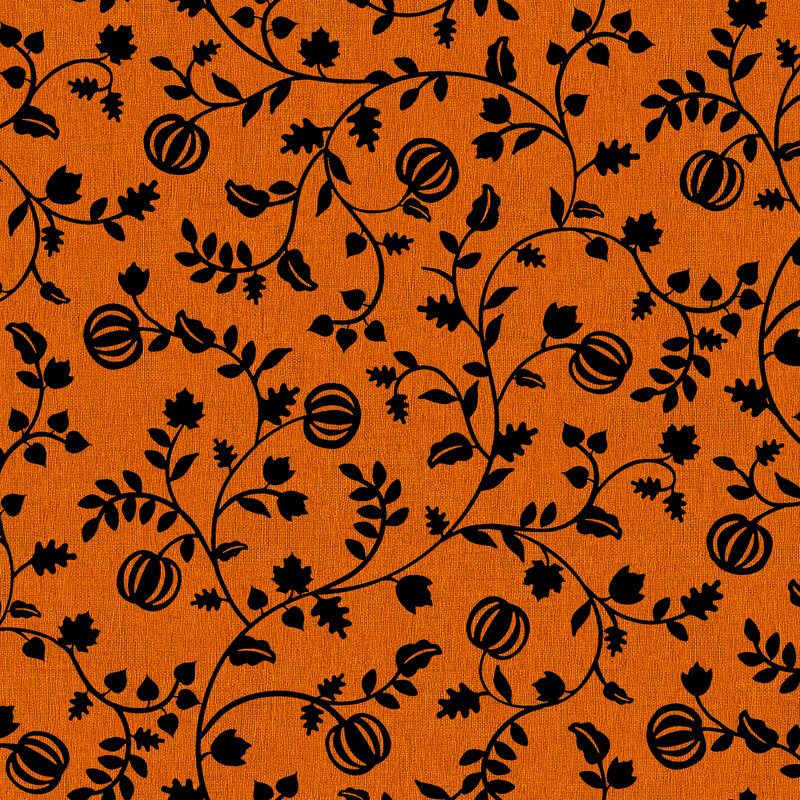 Twisting jet black vines with growing pumpkins and leaves on pumpkin orange fabric.