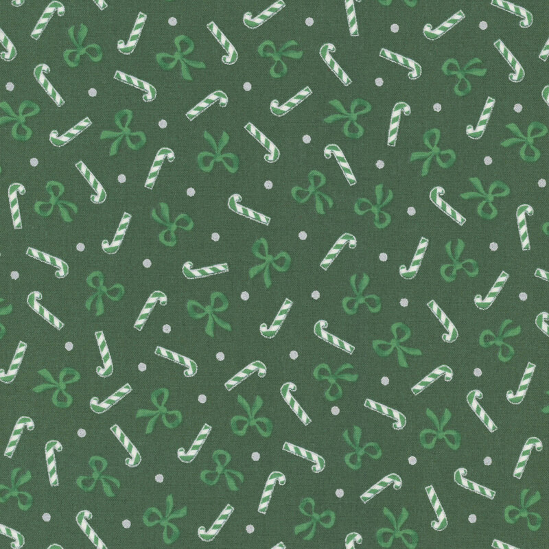 Holly green fabric with a tossed pattern of medium green bows, candy canes, and silver dots