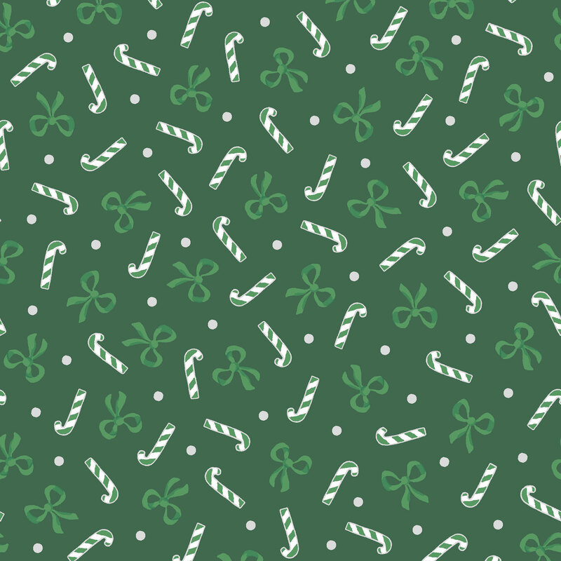 Holly green fabric with a tossed pattern of medium green bows, candy canes, and silver dots